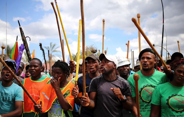 SA mine workers with sticks