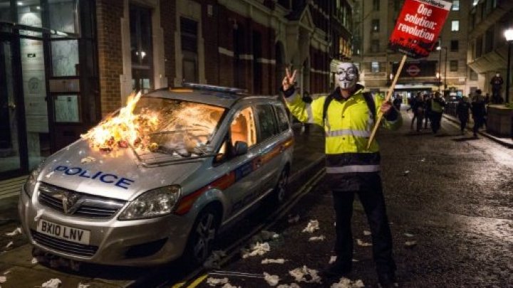 guy fawkes cop car burning london million march